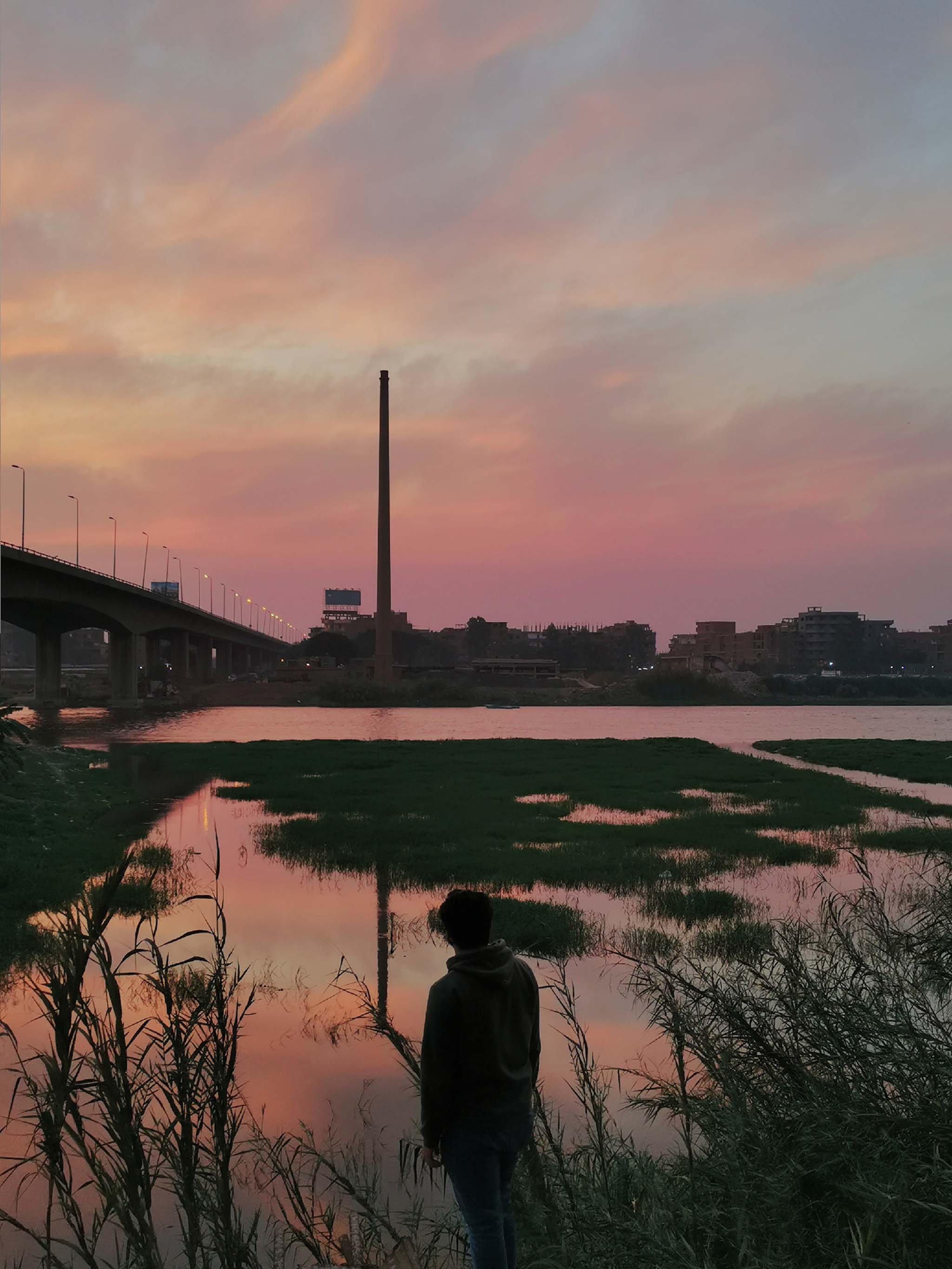 Figure Under Pink Sunset